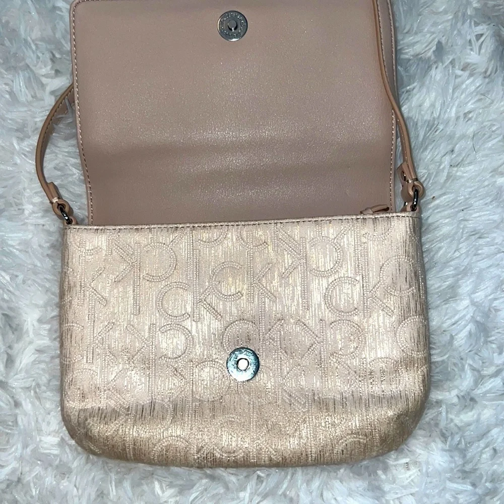 Calvin Klein - small clutch - beige color